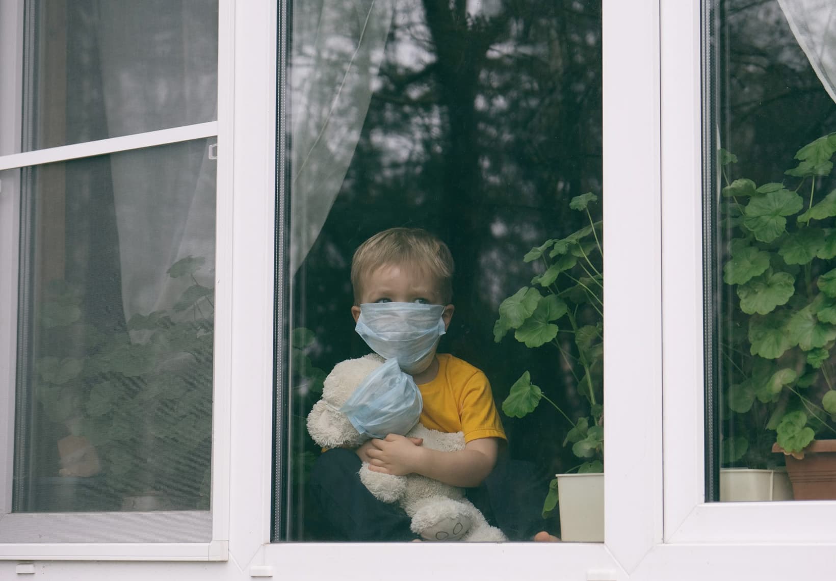 pediatric-child-staring-through-window